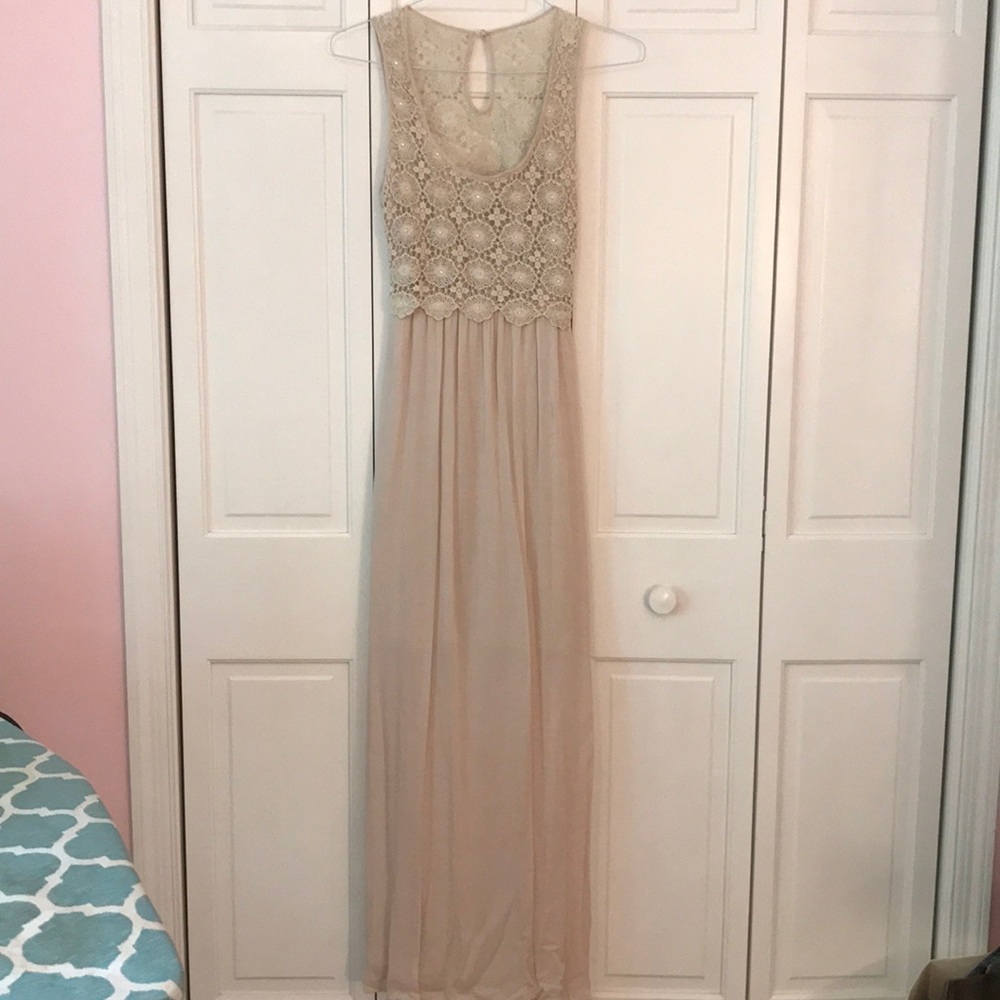 Nude maxi dress with open back